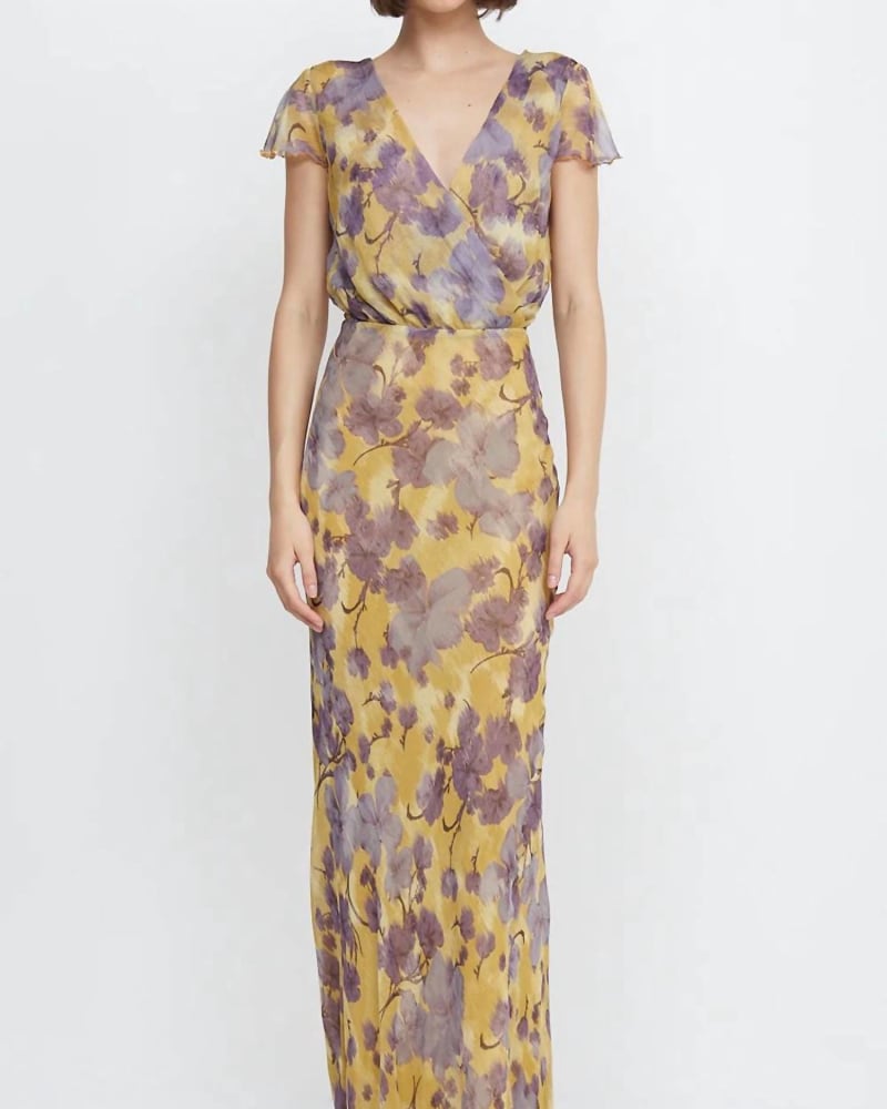 Front of a model wearing a size 10 Bernadette Wrap Maxi Dress In Golden Violet in Golden Violet by BEC + BRIDGE. | dia_product_style_image_id:344752